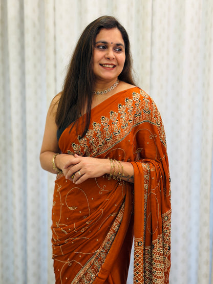 Rust Orange Ajrakh Modal Handwork Saree