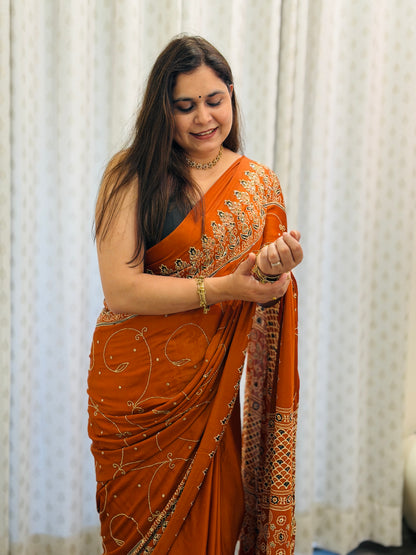 Rust Orange Ajrakh Modal Handwork Saree