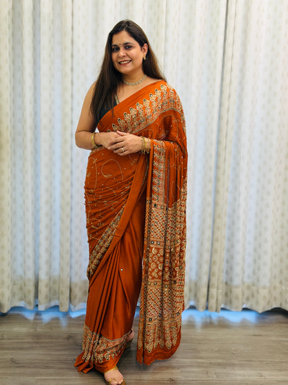 Rust Orange Ajrakh Modal Handwork Saree