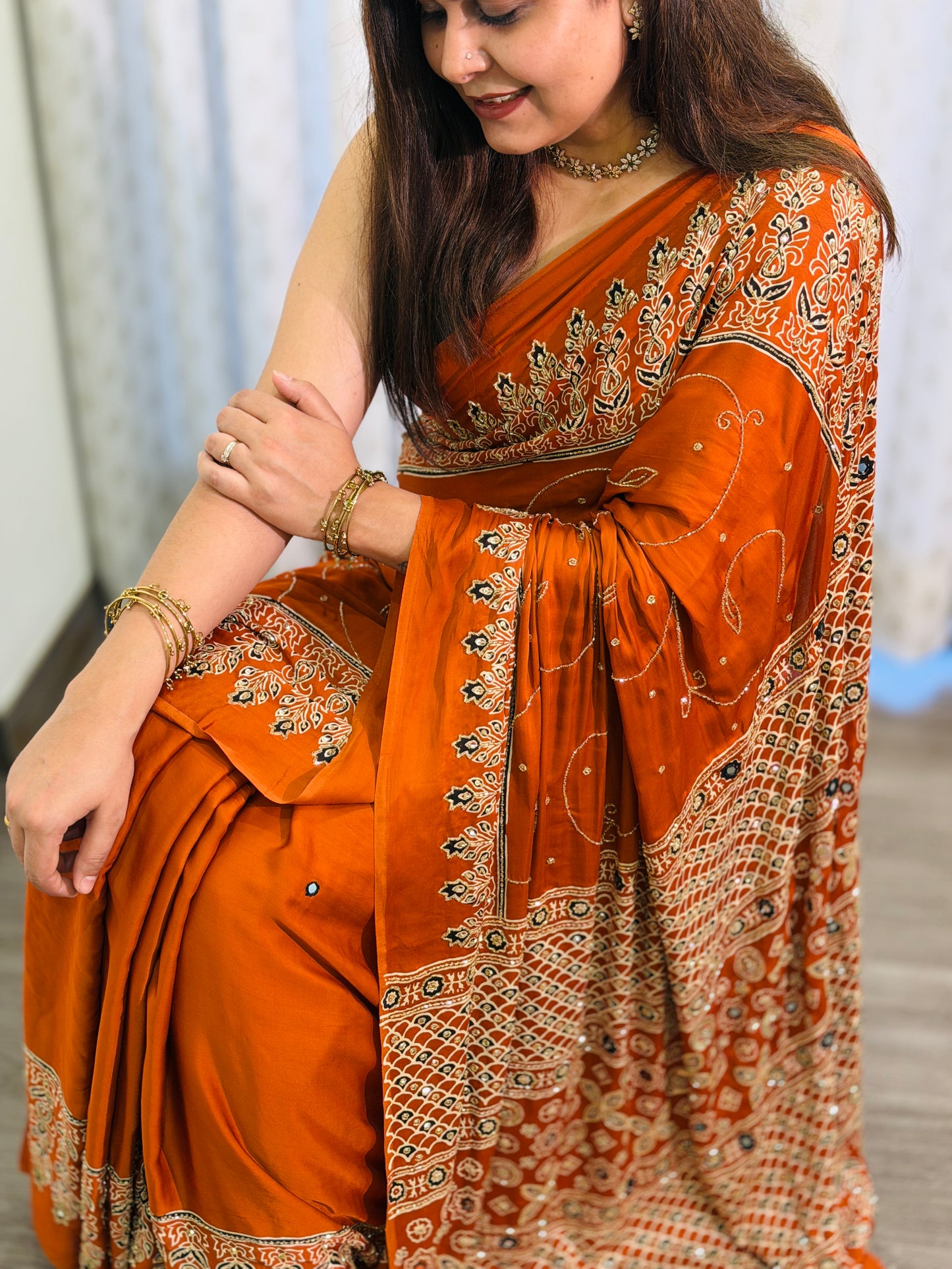 Rust Orange Ajrakh Modal Handwork Saree