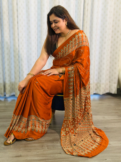 Rust Orange Ajrakh Modal Handwork Saree
